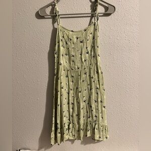Green floral print mini dress with tie straps
